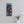Load image into Gallery viewer, Colours of Home canvas print by Adam Young above a white desk with a lamp and plant
