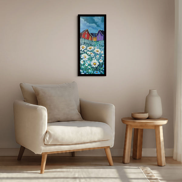 Daisies by Adam Young framed in black on a beige living room wall above a linen armchair and wooden side table