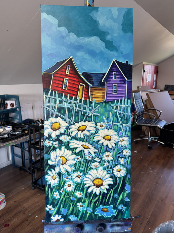 The original Daisies painting by Adam Young on the easel in the artist's Newfoundland studio