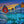 Load image into Gallery viewer, Forget Me Nots by Adam Young — blue forget-me-nots and colourful saltbox homes at sunset
