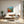 Load image into Gallery viewer, Patch of Poppies by Adam Young hung in a bright living room
