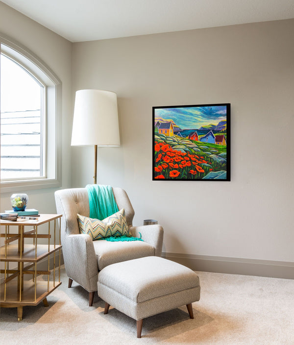 Patch of Poppies by Adam Young framed beside an armchair and reading lamp