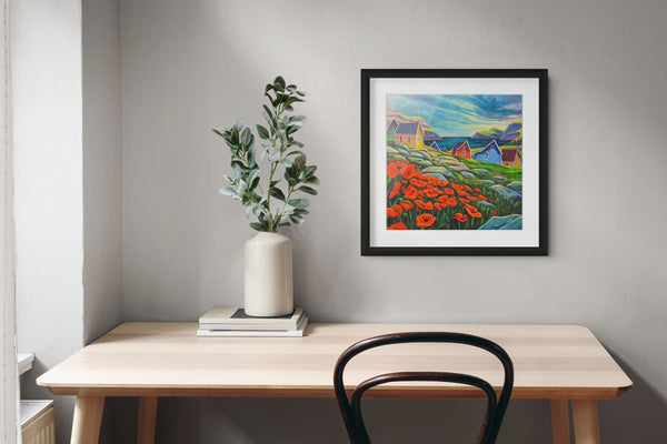 Patch of Poppies by Adam Young framed above a desk