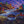Load image into Gallery viewer, The Last Boat Home by Adam Young — a wooden dory on the launchway at dusk in a colourful Newfoundland outport
