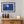 Load image into Gallery viewer, All the Lights On framed paper print shown in a room setting
