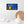 Load image into Gallery viewer, Bright Little Town canvas shown in a room setting (2)
